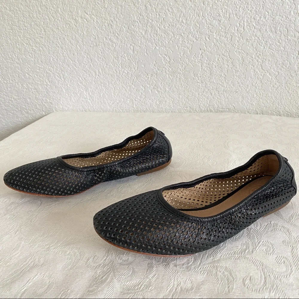 Tory Burch black perforated flats